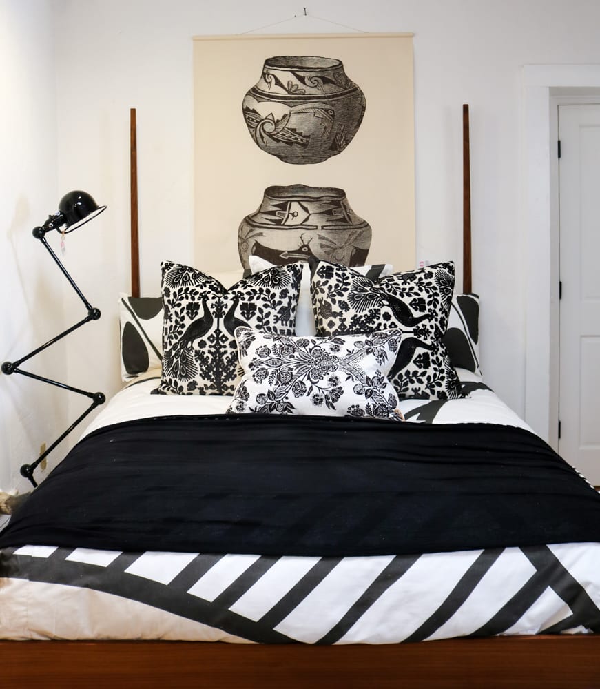 showhouse bedroom with black and white decor