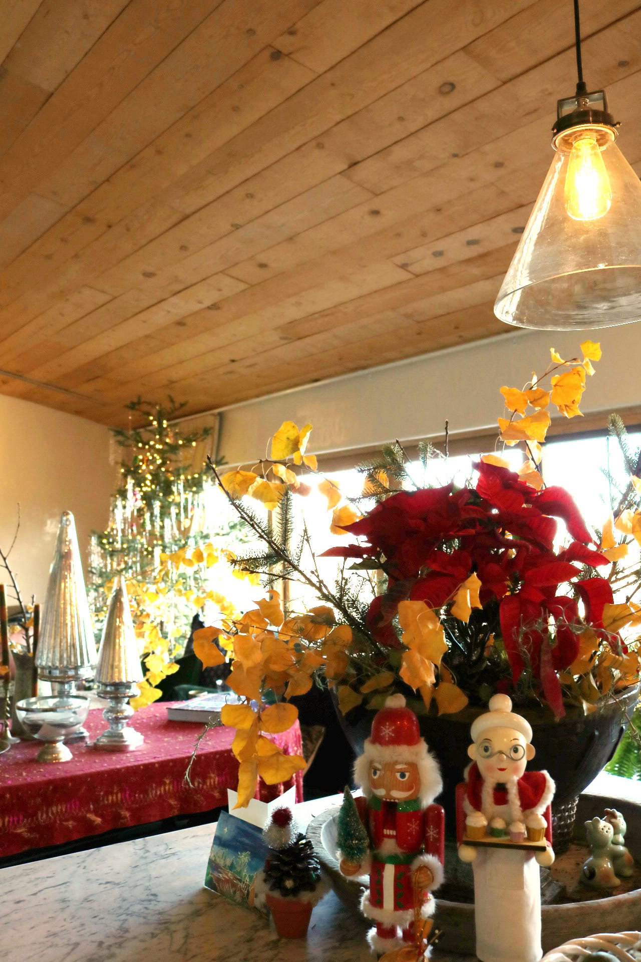 French & French Interiors table Christmas decorations including nutcrackers and holiday plants